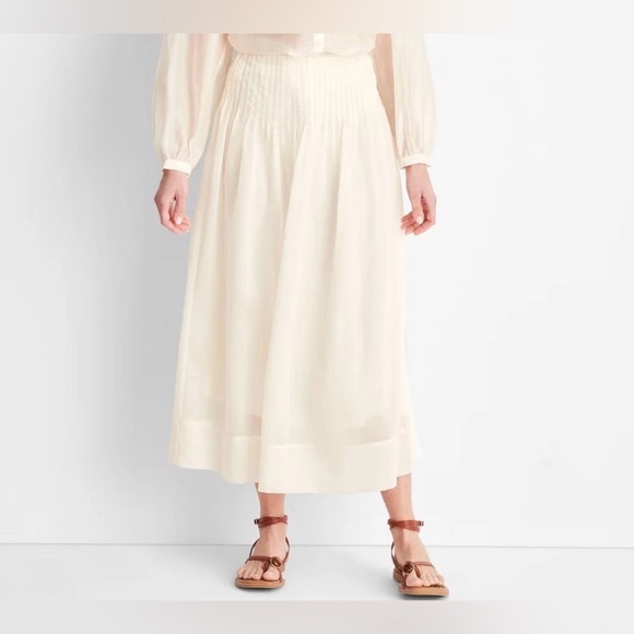 Future Collective Dresses & Skirts - Future Collective cream maxi skirt with zipper and pleated detailing.